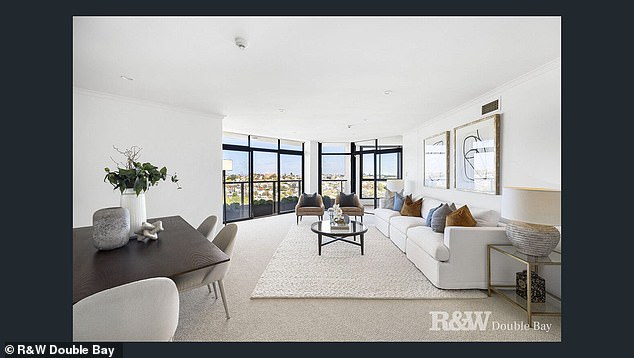 The apartment has spectacular views of Sydney as well as access to the shopping center below.