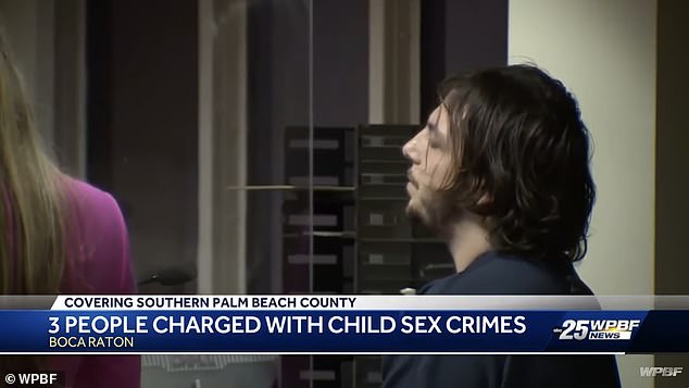 Matthew Cassini shook his head as the child sexual abuse charges were read.