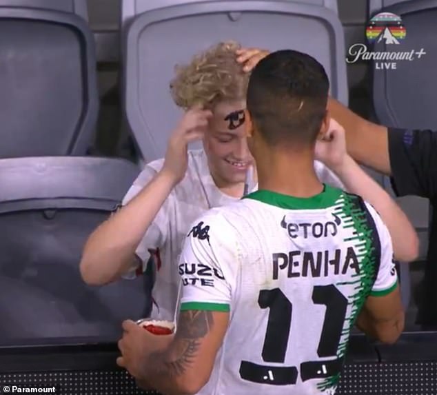 After the final whistle, Penha showed his bold side and signed an autograph on his forehead for an enthusiastic Wanderers fan (pictured).