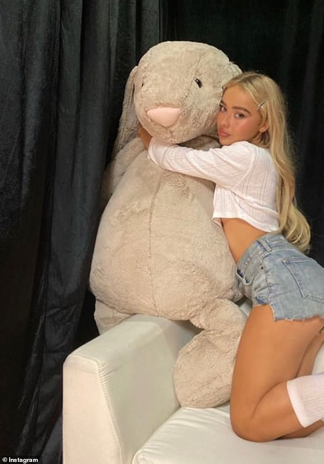 Documenting her journey on Instagram ahead of her final support show in Singapore, Sabrina also shared a photo of herself cuddling a giant stuffed Jellycat bunny.