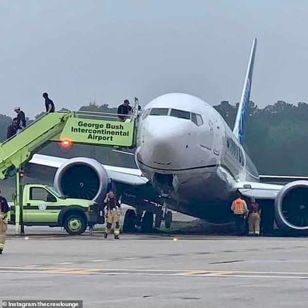 The plane skidded off the runway and onto the grass at Houston's George Bush Intercontinental Airport, and none of the passengers or crew were injured.
