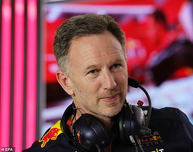 Christian Horner smiles in the pits during qualifying for the Formula One Saudi Arabian Grand Prix