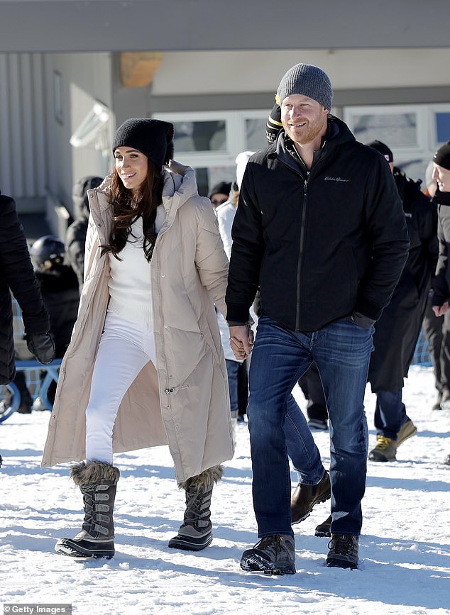 Since June, the Duke's immigration status has been under scrutiny after the conservative group Heritage Foundation sent a public information request to the Department of Homeland Security seeking Harry's records (pictured with Meghan Markle in British Columbia, February 14 ).