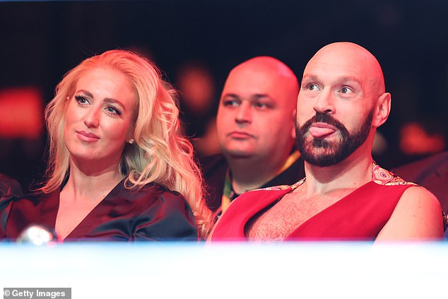 Earlier in the night, the WBC heavyweight title holder and his wife watched his brother Roman Fury, 27, outpoint Martin Svarc.