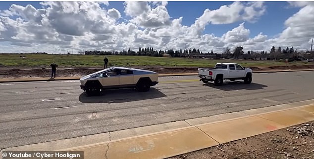 The video shows the truck giving up on its first attempt and allowing the Silverado to drag the 5,500-pound electric vehicle behind it.