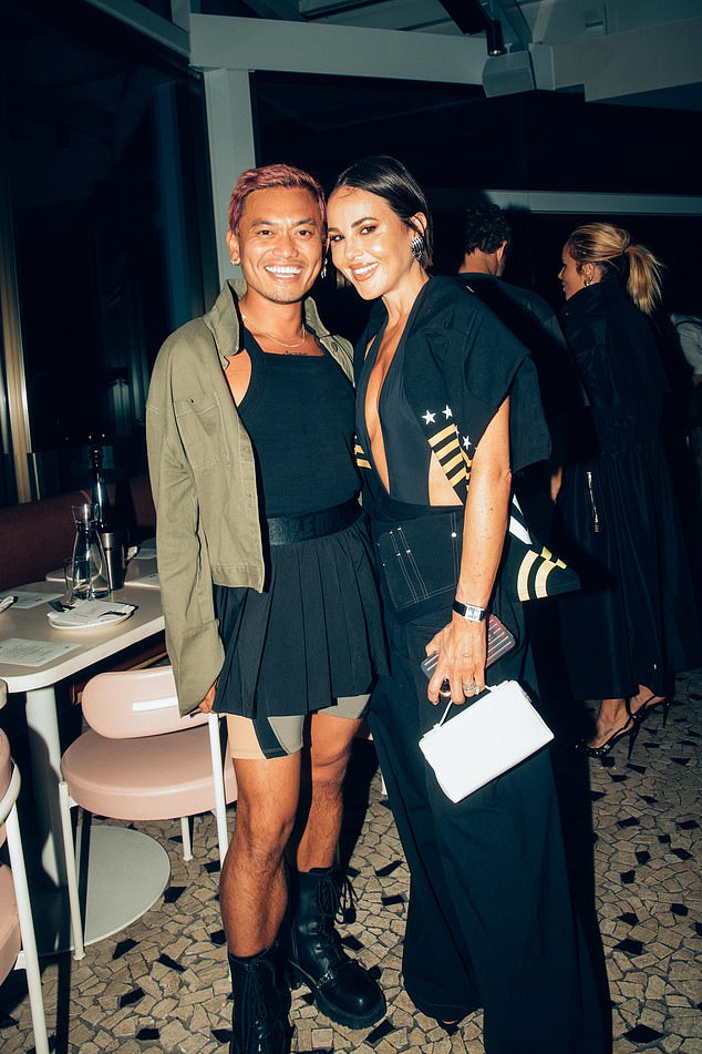 While MasterChef Australia star Khanh Ong (left) looked stylish in a pair of biker shorts, a pleated skirt and a black tank top under a khaki jacket (pictured with Sarah Lucas).