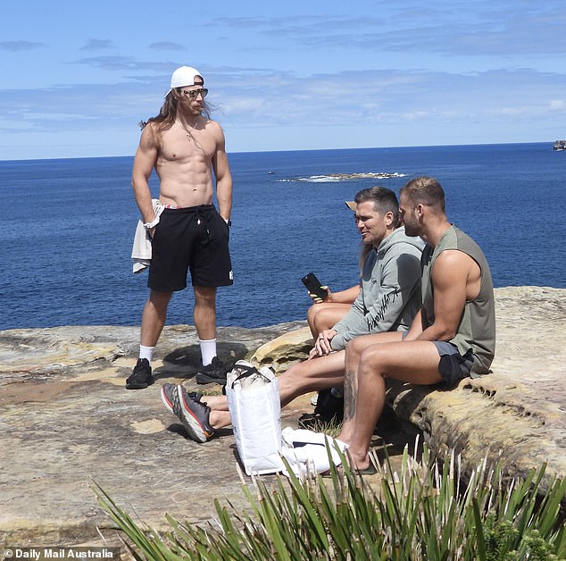 The quartet of reality stars were seen chatting on the edge of a cliff for several minutes