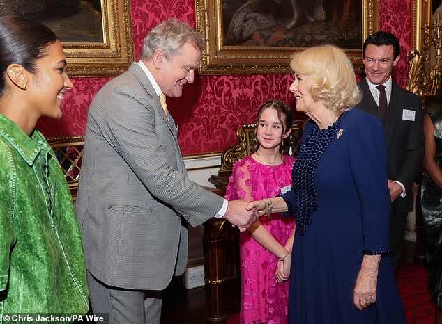 Hugh also took the actress to an event at Buckingham Palace where she met Queen Camilla.