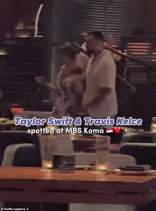 1710044477 206 Taylor Swift holds hands with Travis Kelce during a romantic