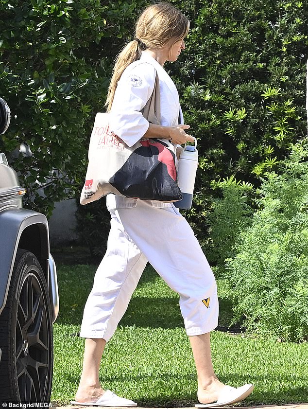 At another point, she was seen running errands in a pair of white sweatshirts and a matching blouse, with her caramel-colored hair pulled back into a ponytail.