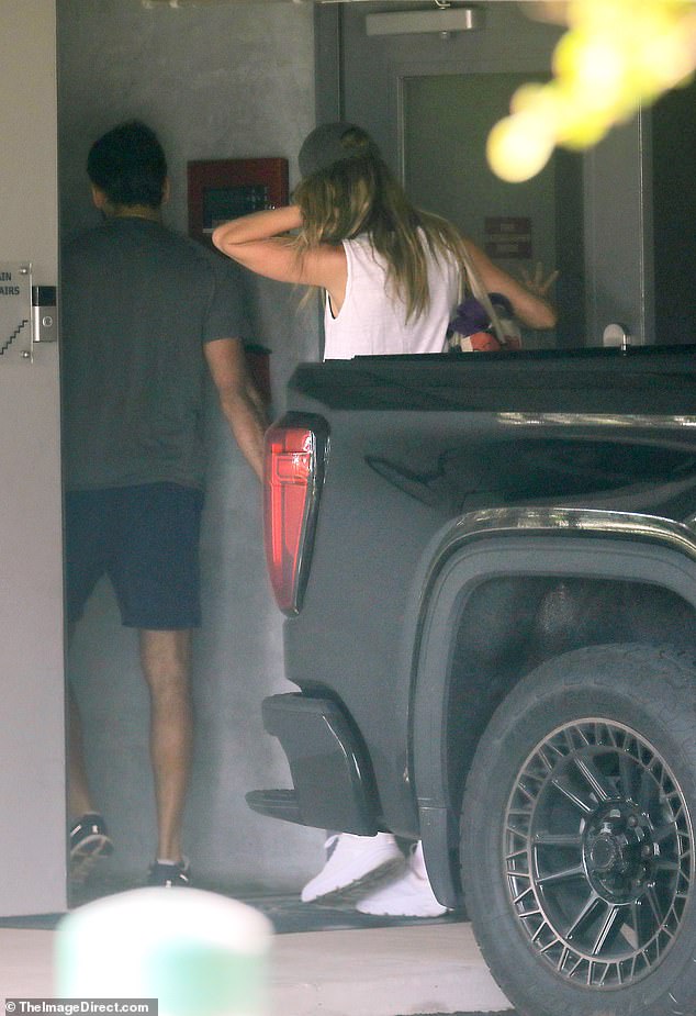 The couple was seen entering a building together after working out.