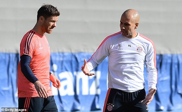 One of Guardiola's former players, Xabi Alonso (left), is one of the most sought after managers in Europe at the moment and has been heavily linked with the Liverpool job.