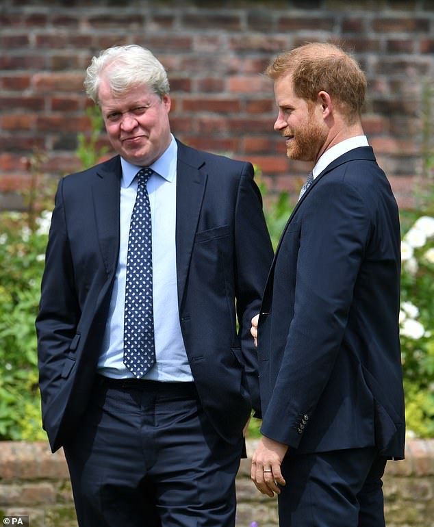 Lady Kitty's father, Earl Spencer, 57, did not attend. Pictured, Prince Harry, with his uncle Earl Spencer, unveiling a statue of his mother Diana, Princess of Wales, in the Sunken Garden of Kensington Palace, London, on what would have been her 60th birthday on July 1, 2021.