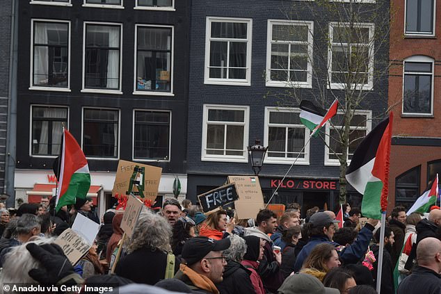 Protesters took to the streets on the day a National Holocaust Museum opened