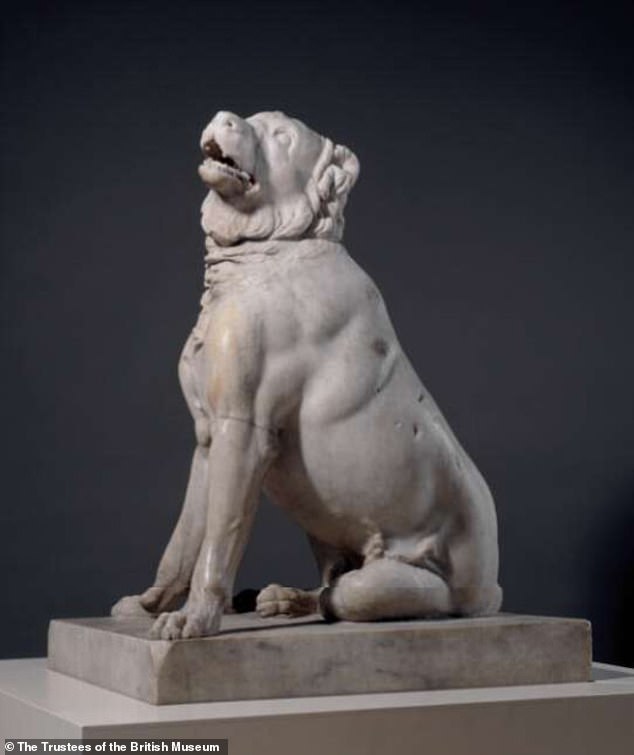 A statue of a molosser dog.