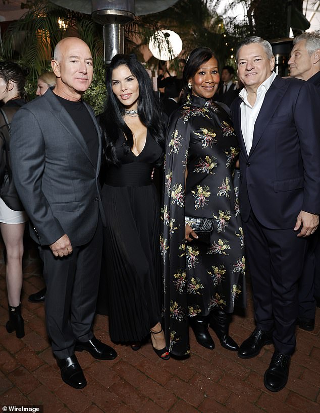 The billionaire businessman, 59, and his glamorous partner Lauren, 54, posed alongside Nicole Avant and Ted Sarandos