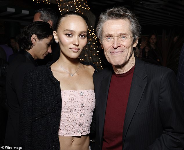 She later posed with actor Willem Dafoe