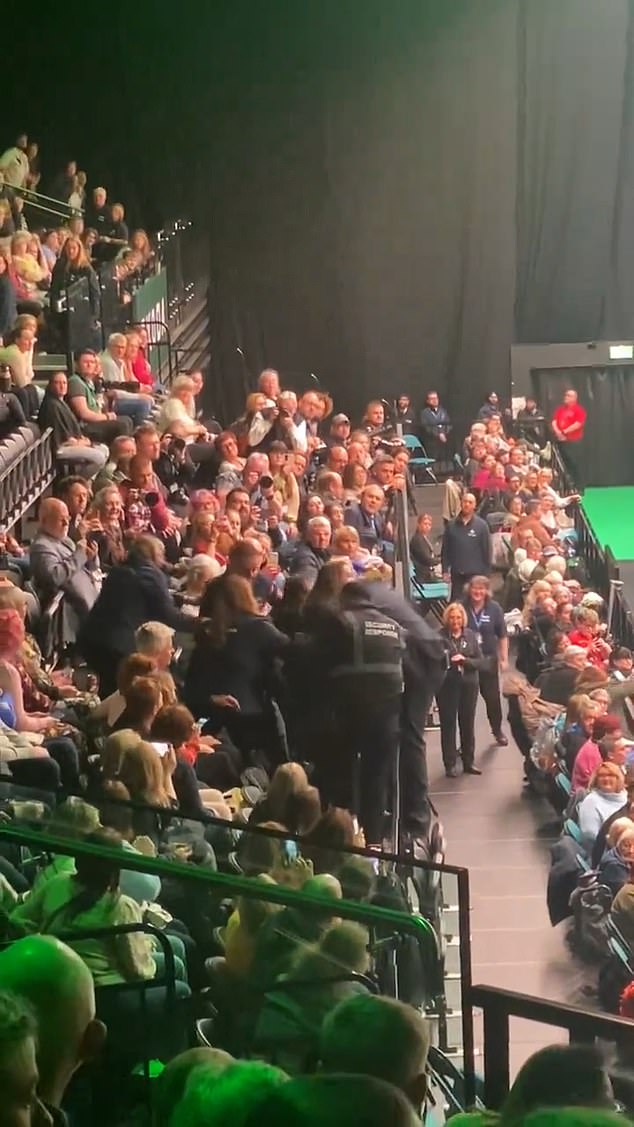 1710106345 97 Protesters storm Crufts PETA activists calling for breeder boycott tussle