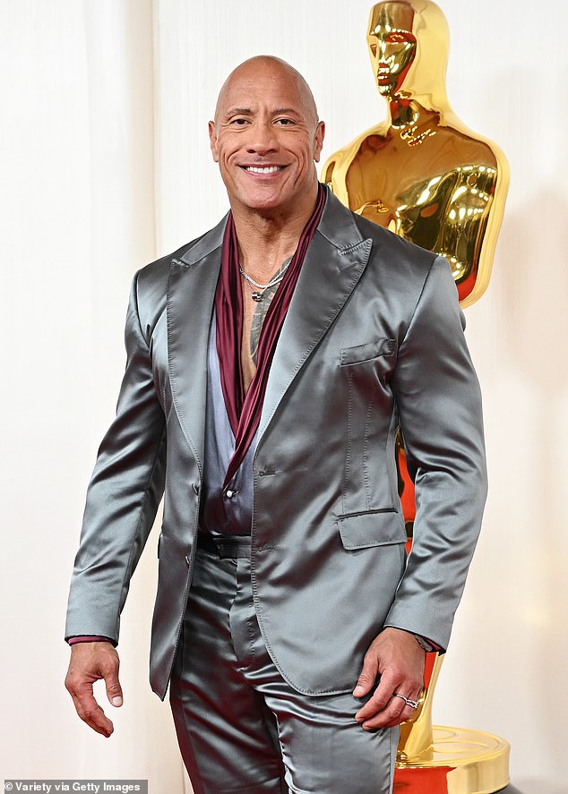 Dwayne Johnson did not stand out as much in a completely metallic suit, which almost showed his navel.