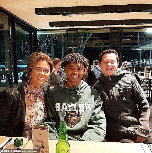 A younger Connor is shown with his mother Fiona and younger brother Tane, who have been his biggest supporters while growing up.