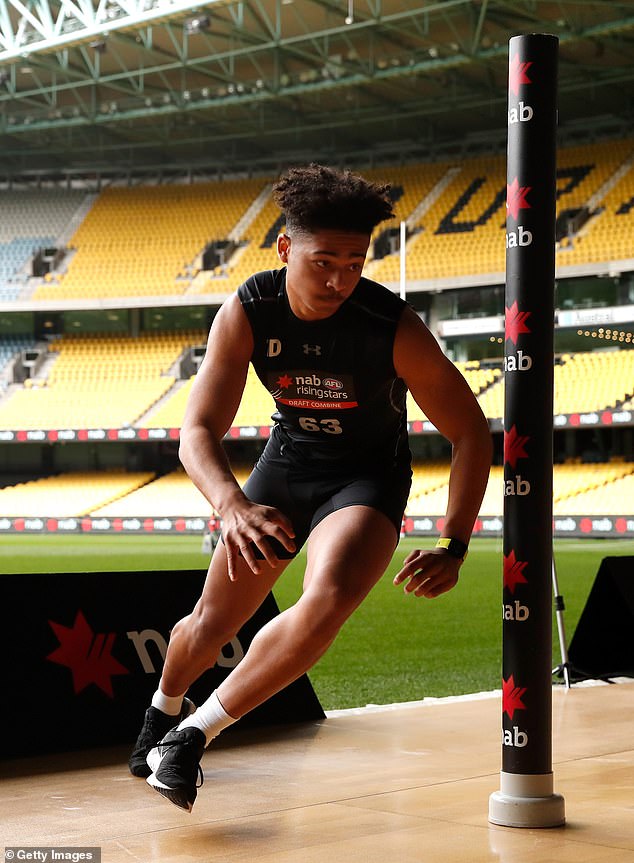 Idun is pictured taking the agility test during the 2018 AFL Draft Combine at Marvel Stadium.
