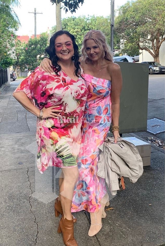 The 52-year-old looked almost unrecognizable as she posed for pictures with a friend