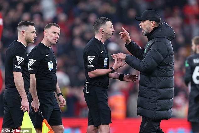Jurgen Klopp was seen confronting Oliver on the pitch after the final whistle before accepting that his team should have been awarded a penalty.