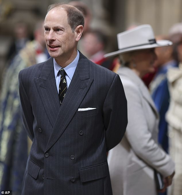 The Duke of Edinburgh looked dapper in a black striped suit and crisp blue shirt for the occasion.