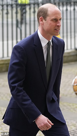 A smiling Prince William enters the Commonwealth Service this afternoon