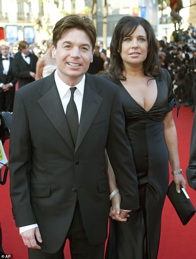 Mike Myers' ex-wife Robin Ruzan is listed as one of the executors of Perry's will - both Perry and Ruzan worked on the game show Celebrity Liar in the 2010s (pictured with Myers in 2004)