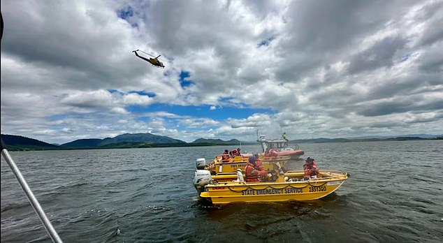 Pictured: Search and rescue boats search for Craig after he went missing on Saturday at Kinchant Dam, about 35km west of the Queensland town of Mackay