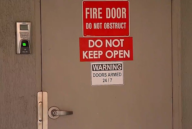 Pictured: A fire exit door at City West Medical Center in Auburn, where the boy was found