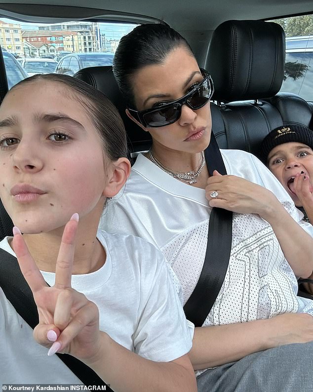 Kourtney traveled Down Under with Travis, their son Rocky, four months, and her children Penelope, 11, and son Reign, eight - who she shares with ex Scott Disick