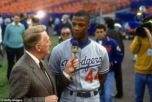 The former outfielder is interviewed by Vince Scully before a game in Queens in 1991