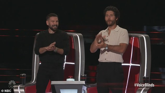 Dan + Shay also stood as they clapped for Elyscia