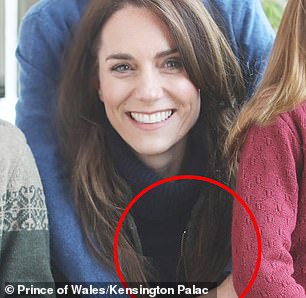 Kate's zipper appears to be misaligned in the photo as the top of it is further to the left and appears significantly lighter than the rest of the zipper