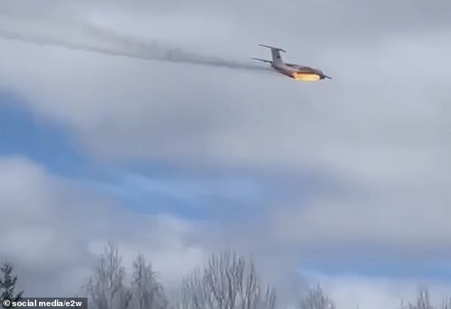 Flames can be seen coming out of what appears to be one of the plane's engines in footage posted by local residents