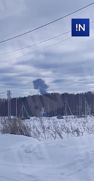 Smoke rises from the apparent crash site