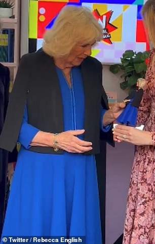 Queen Camilla is presented with her Barbie doll at Buckingham Palace