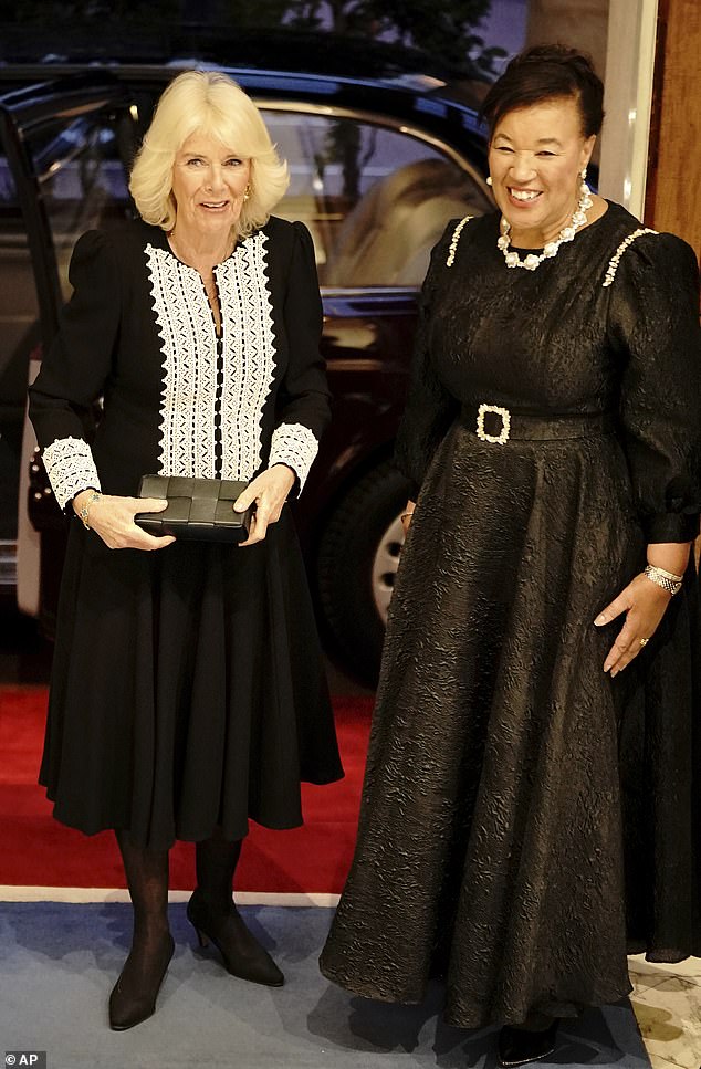 Baroness Scotland of Asthal also chose a black evening dress with a jacquard effect and a sparkling belt at the waist