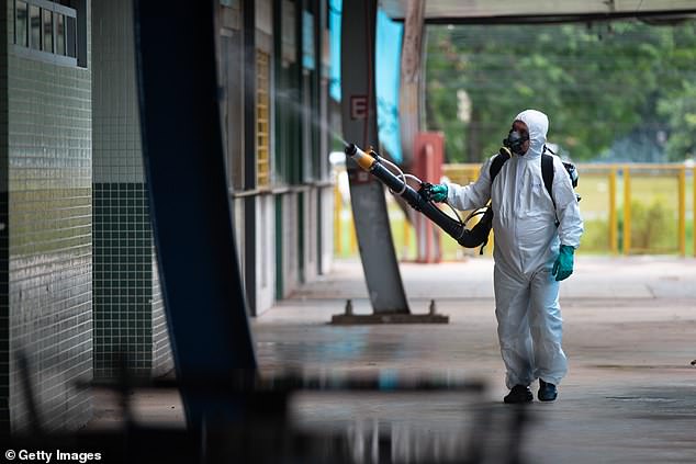 Brazilian officials have begun disinfecting the streets of major cities and hunting the mosquitoes that transmit dengue