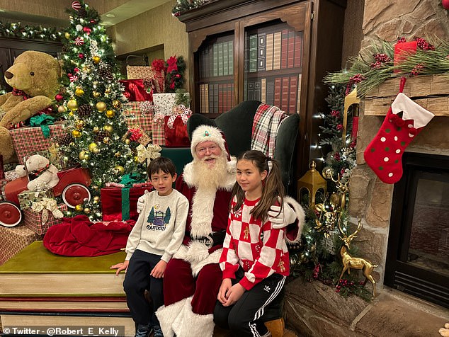 The happy dad also shared a photo of Marion and James visiting Santa over Christmas