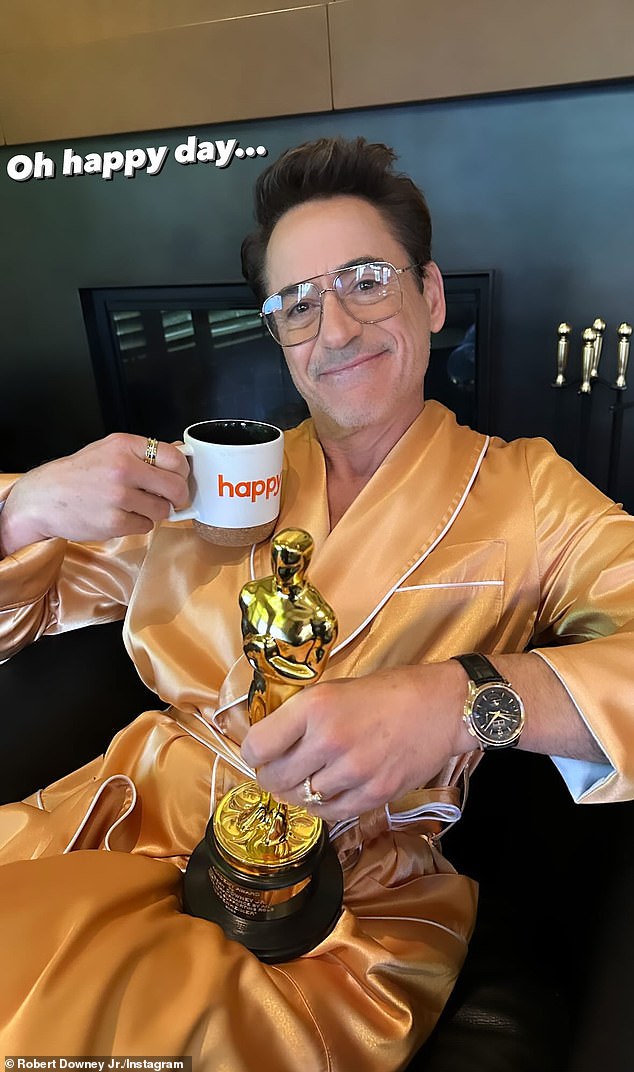 Robert - who boasts 113.5 million followers on social media - Instagrammed a triumphant morning-after snap with his golden statuette on Monday, captioning: 'Oh happy day...'