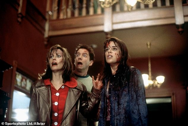 The star is pictured in a bloody scene in Scream with Courteney Cox and Jamie Kennedy