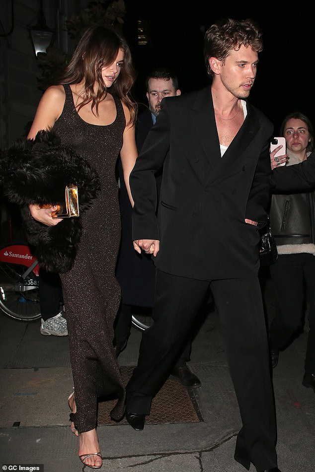 Kaia and boyfriend Austin were spotted heading inside a Dune Part Two after-party in London last month;  pictured on February 15 in London heading to the after party