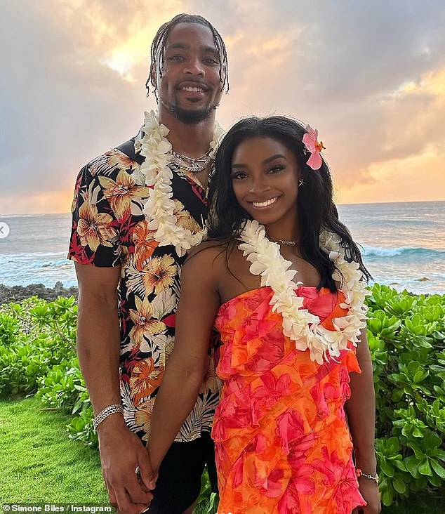 Simone recently cut a vivacious figure in a pink and orange ruffled dress while in Hawaii