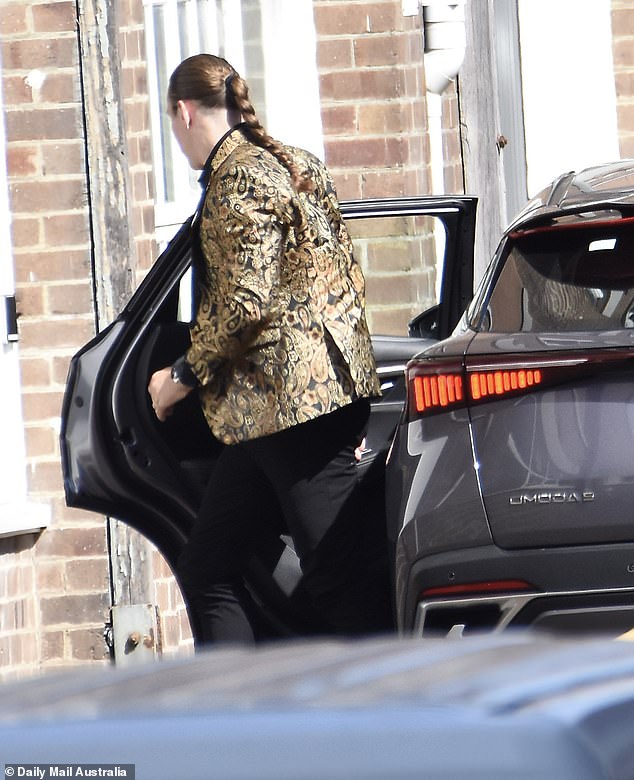 Jayden, meanwhile, grabbed attention dressed in a gold and black brocade blazer, black trousers and black shoes