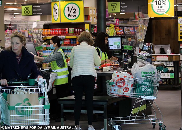 The Association of Superannuation Funds of Australia (ASFA) estimates that a single retiree will need $51,278 a year for their lifestyle, assuming they have paid off their home (pictured is a Woolworths supermarket in Sydney's east)