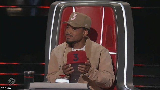 Chance held up his team hat as he tried to get Val on his team