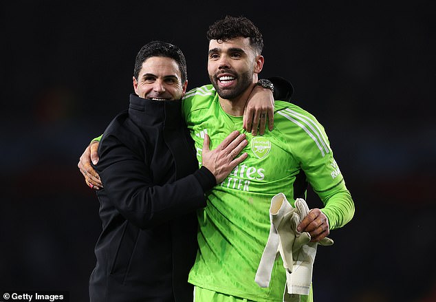 Mikel Arteta (left) praised David Raya (right) after the goalkeeper saved two penalties